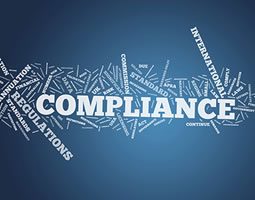 A word cloud with "COMPLIANCE" in the centre.