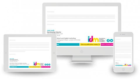 Sig-IDM-triple-screen-v4 A laptop, iPhone, and tablet, all showing an IDM email banner & signature on-screen.