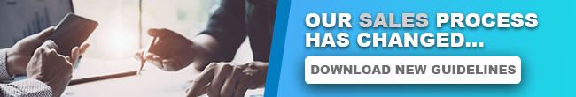 Updated Sales Process email banner An email banner with the words "OUR SALES PROCESS HAS CHANGED... DOWNLOAD NEW GUIDELINES" next to an image of two pairs of hands, one holding a phone.