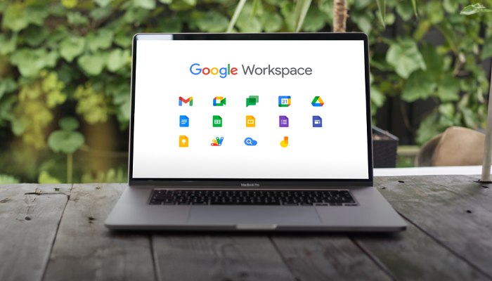 Why Is Company Email Signature Manager A Must For Corporations Using Google Workspace Emails (formerly G Suite)? 10 A laptop on a table displaying Google Workspace and various Google related icons